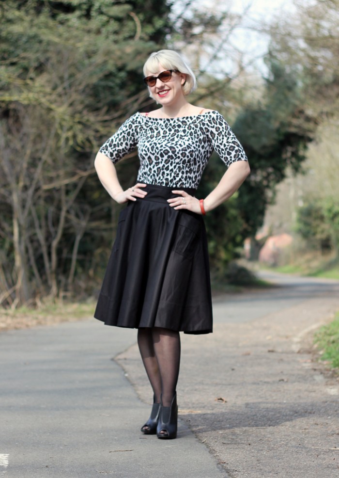 Leopard print bardot top and black circle skirt