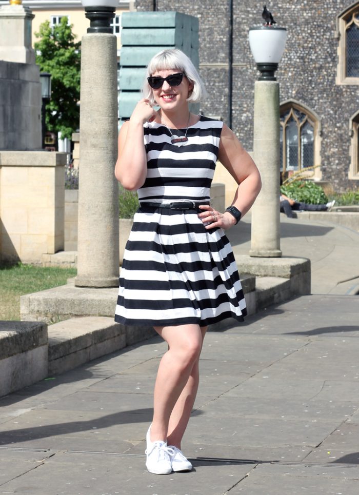 Black and white striped skater dress and sunglasses